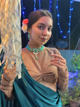 Shimmery nude coloured blouse Satin sari.