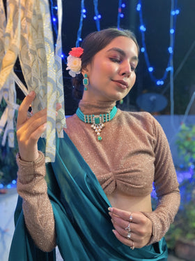 Shimmery nude coloured blouse Satin sari.
