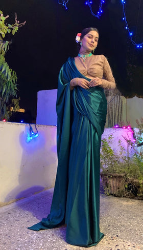 Shimmery nude coloured blouse Satin sari.