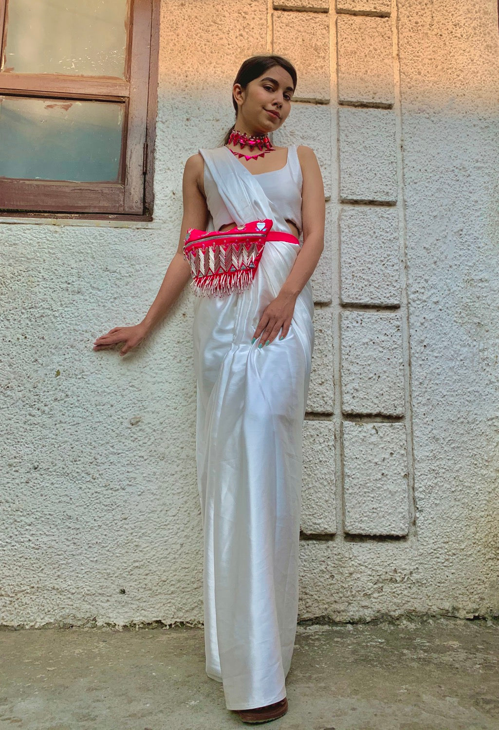 Basic White Sari with round neck blouse.